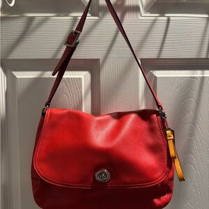 Coach Park Crossbody (F23663) in a bright orange/red or vermillion leather.